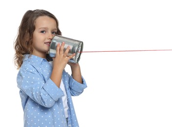 Photo of Girl using tin can telephone on white background