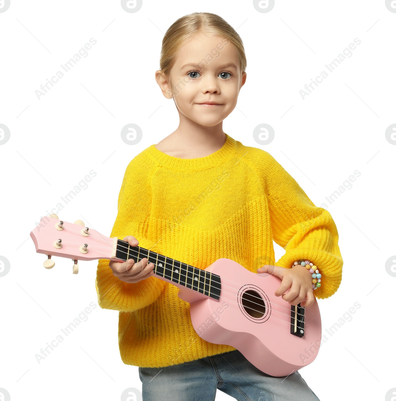 Photo of Little girl playing ukulele on white background