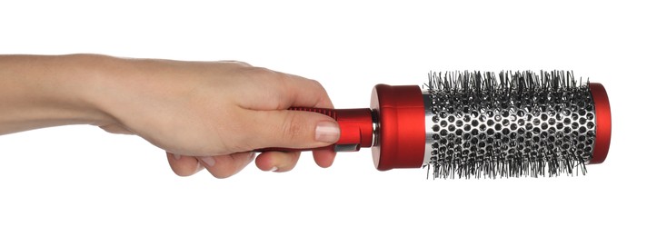 Photo of Woman with round hair brush on white background, closeup