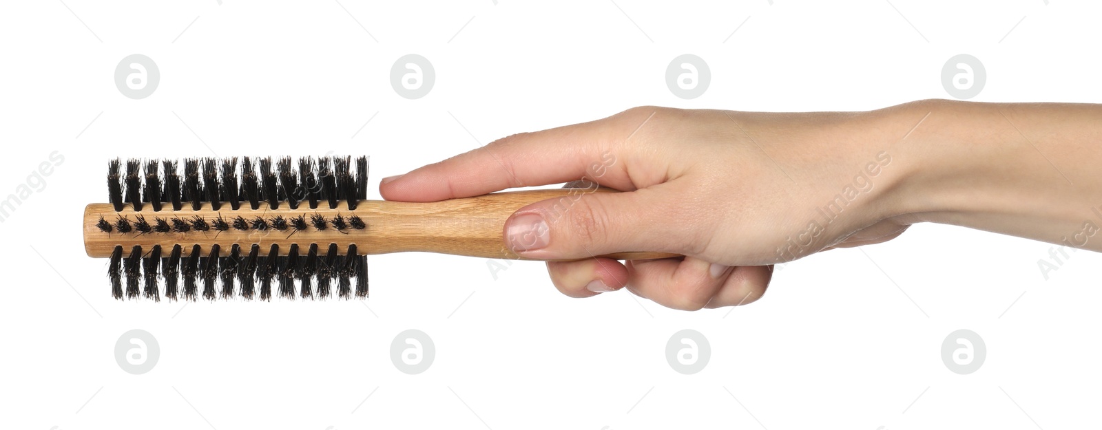 Photo of Woman with round wooden hair brush on white background, closeup