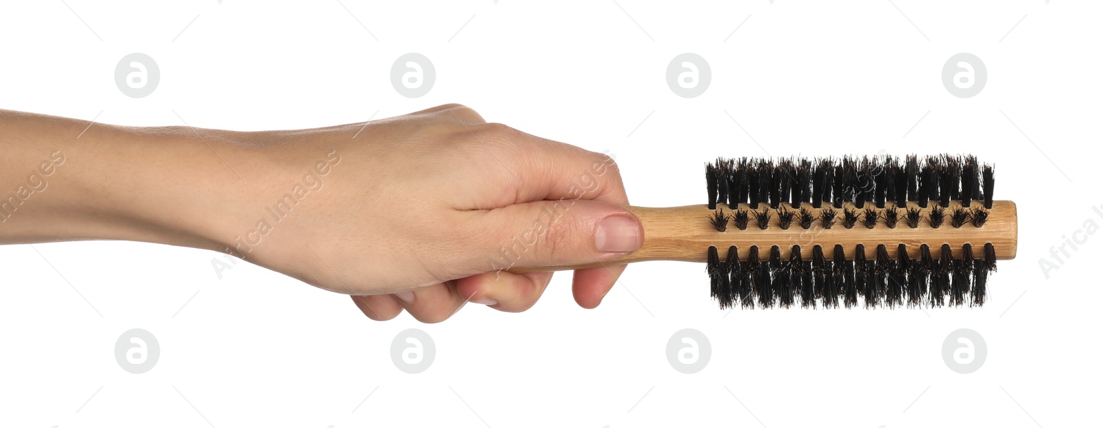 Photo of Woman with round wooden hair brush on white background, closeup