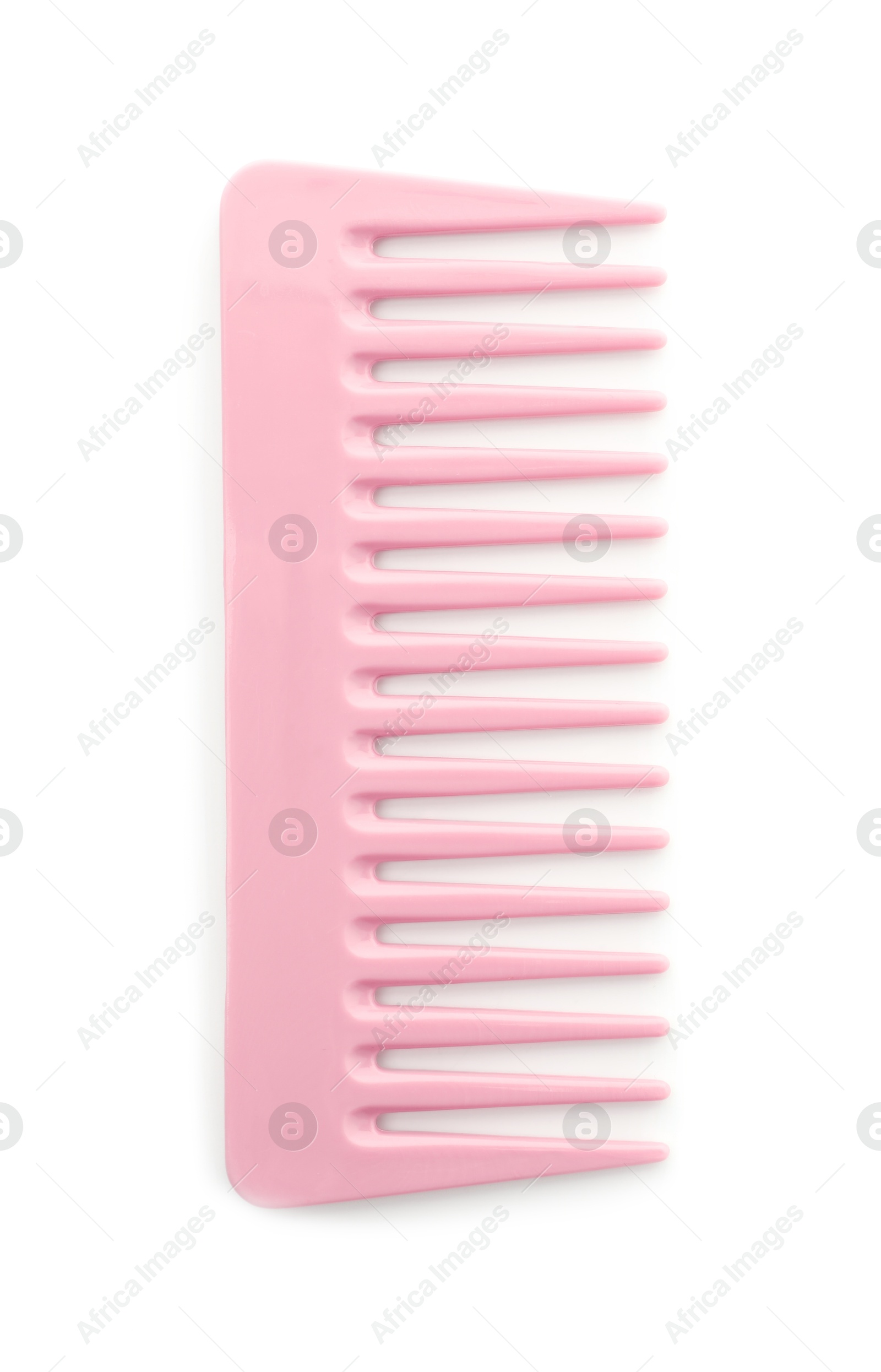 Photo of One pink plastic comb isolated on white, top view