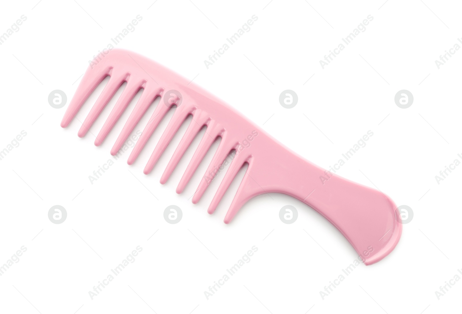 Photo of One pink plastic comb isolated on white, top view