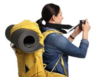 Photo of Young tourist with camera and backpack on white background