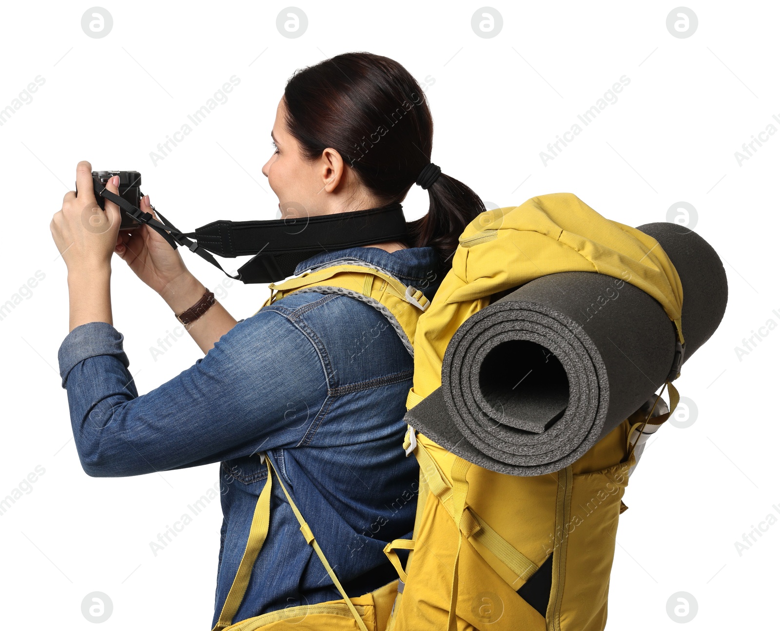 Photo of Young tourist with camera and backpack on white background