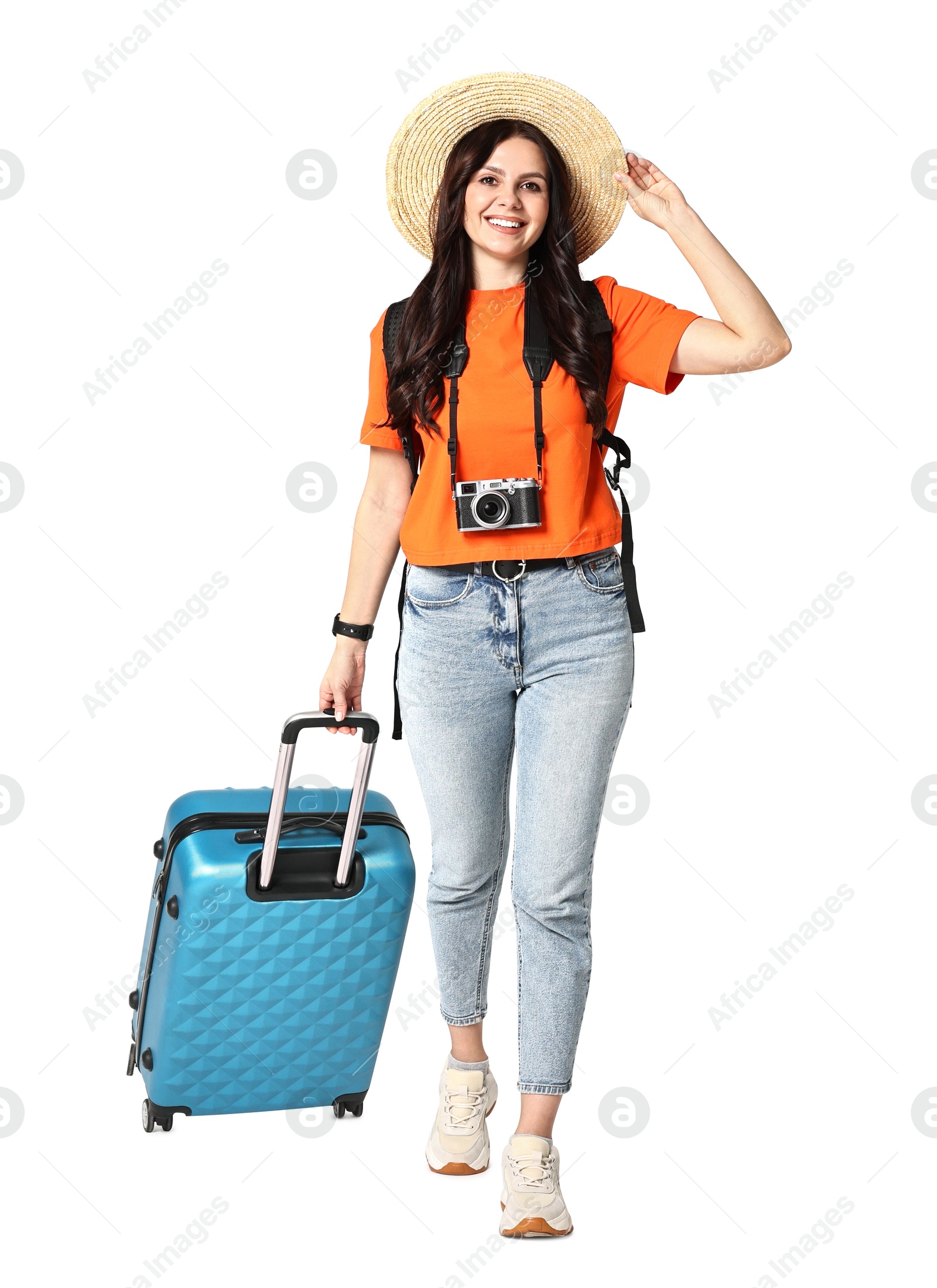 Photo of Young tourist in hat with camera, suitcase and backpack on white background