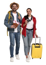 Tourism. Happy couple with passports, tickets, camera and suitcase on white background