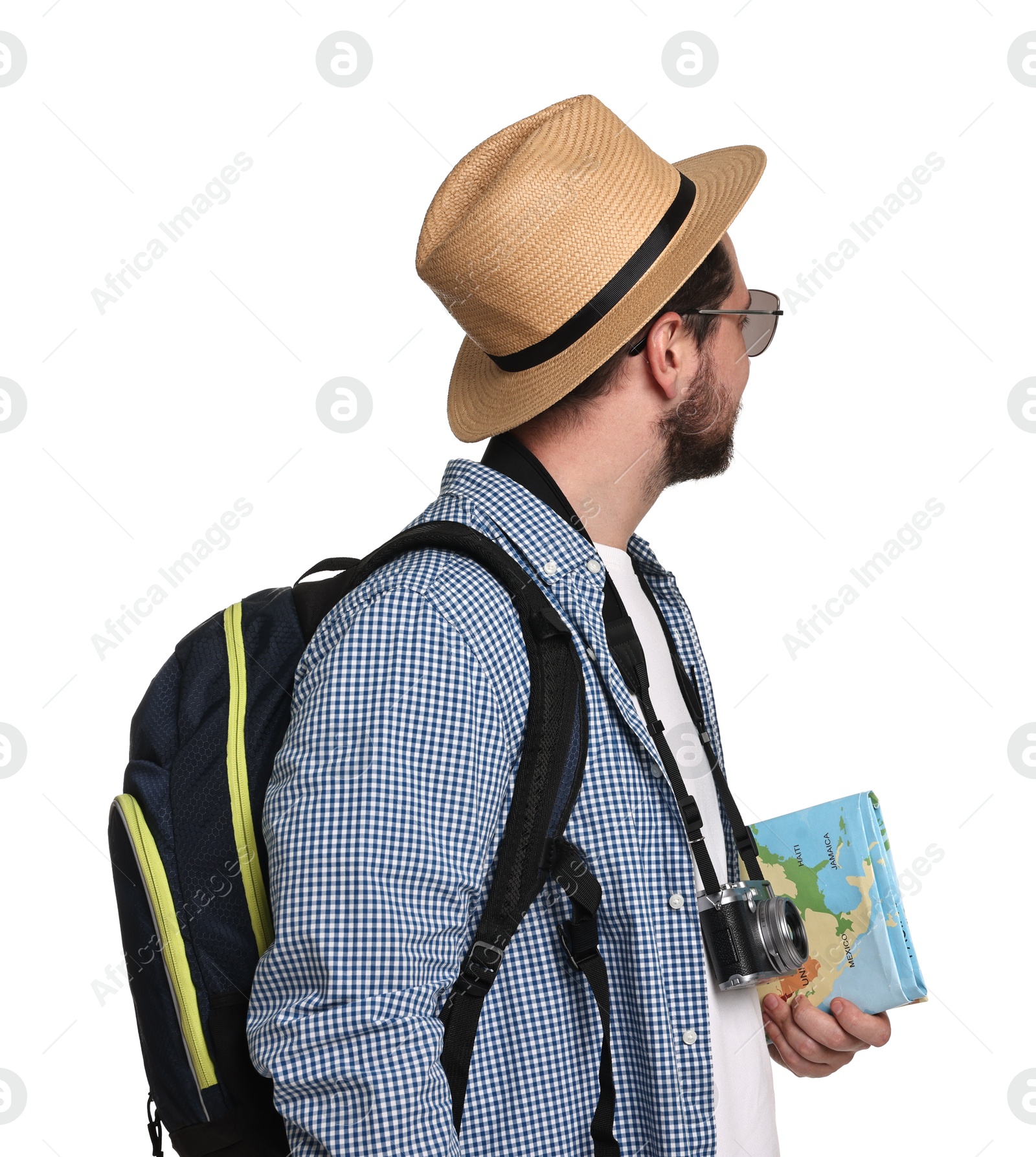 Photo of Tourist in hat with camera, backpack and map on white background