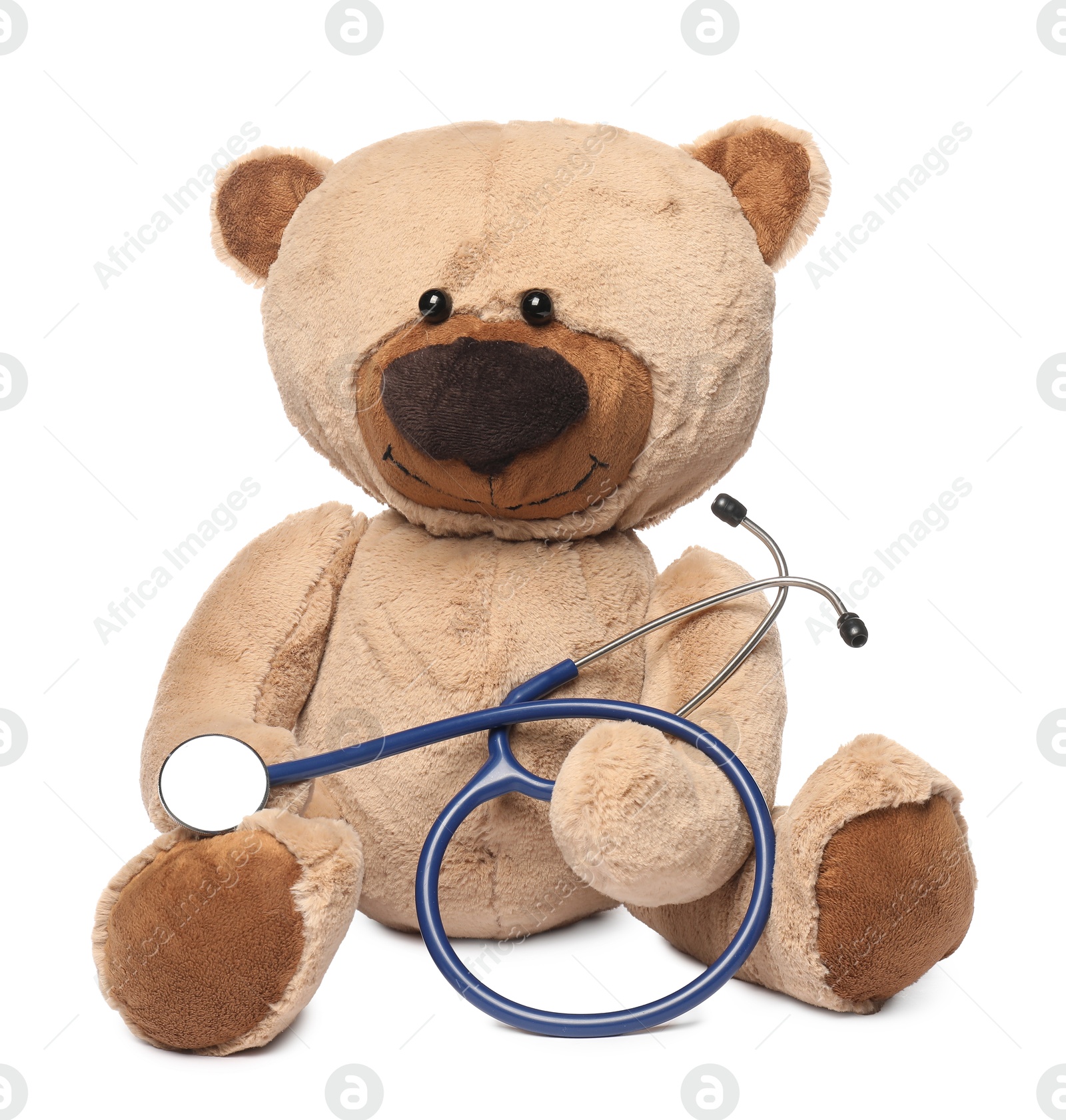 Photo of Pediatrics concept. Teddy bear with stethoscope isolated on white