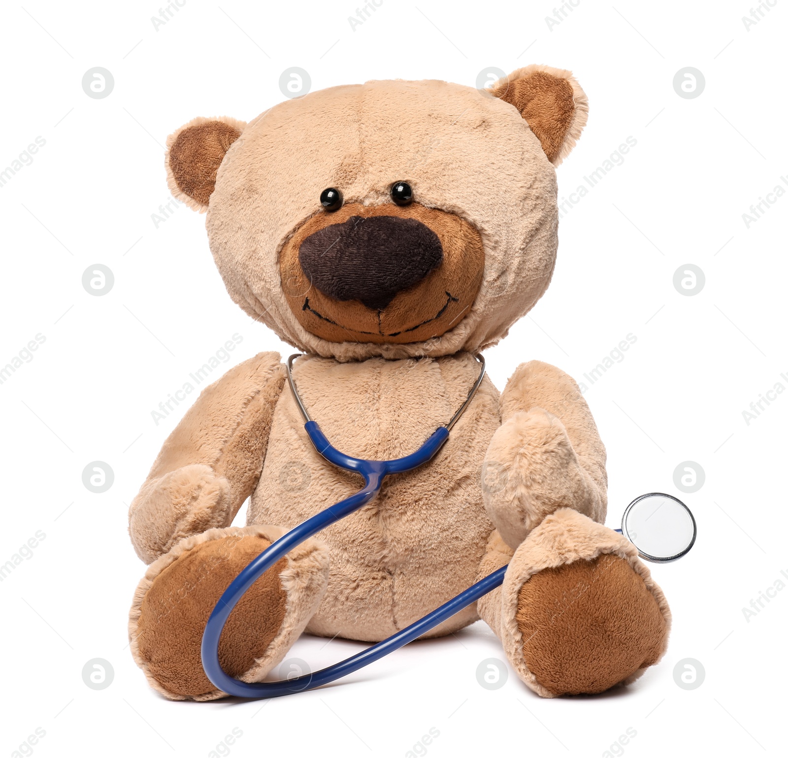 Photo of Pediatrics concept. Teddy bear with stethoscope isolated on white