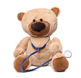 Photo of Pediatrics concept. Teddy bear with stethoscope isolated on white