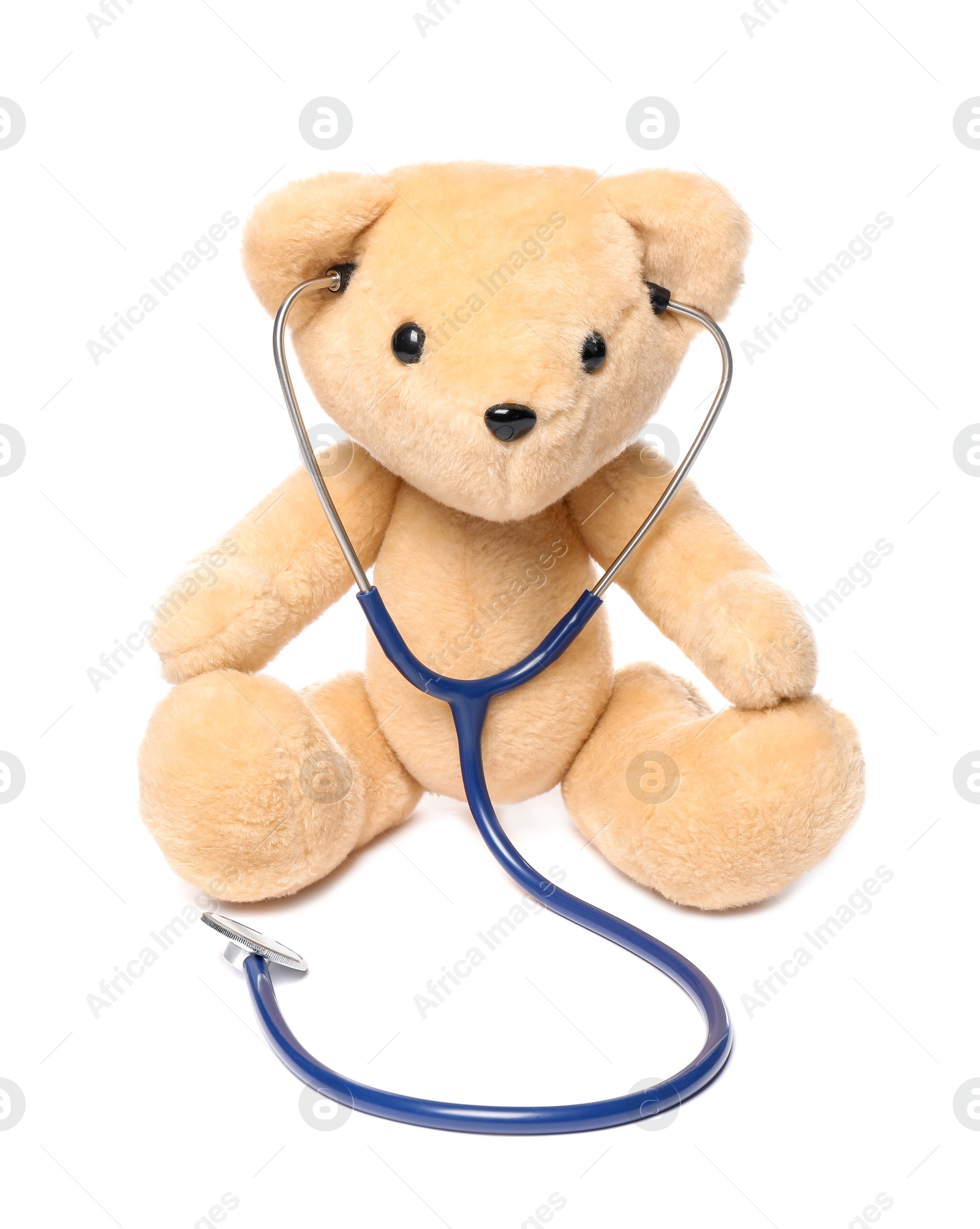 Photo of Pediatrics concept. Teddy bear with stethoscope isolated on white