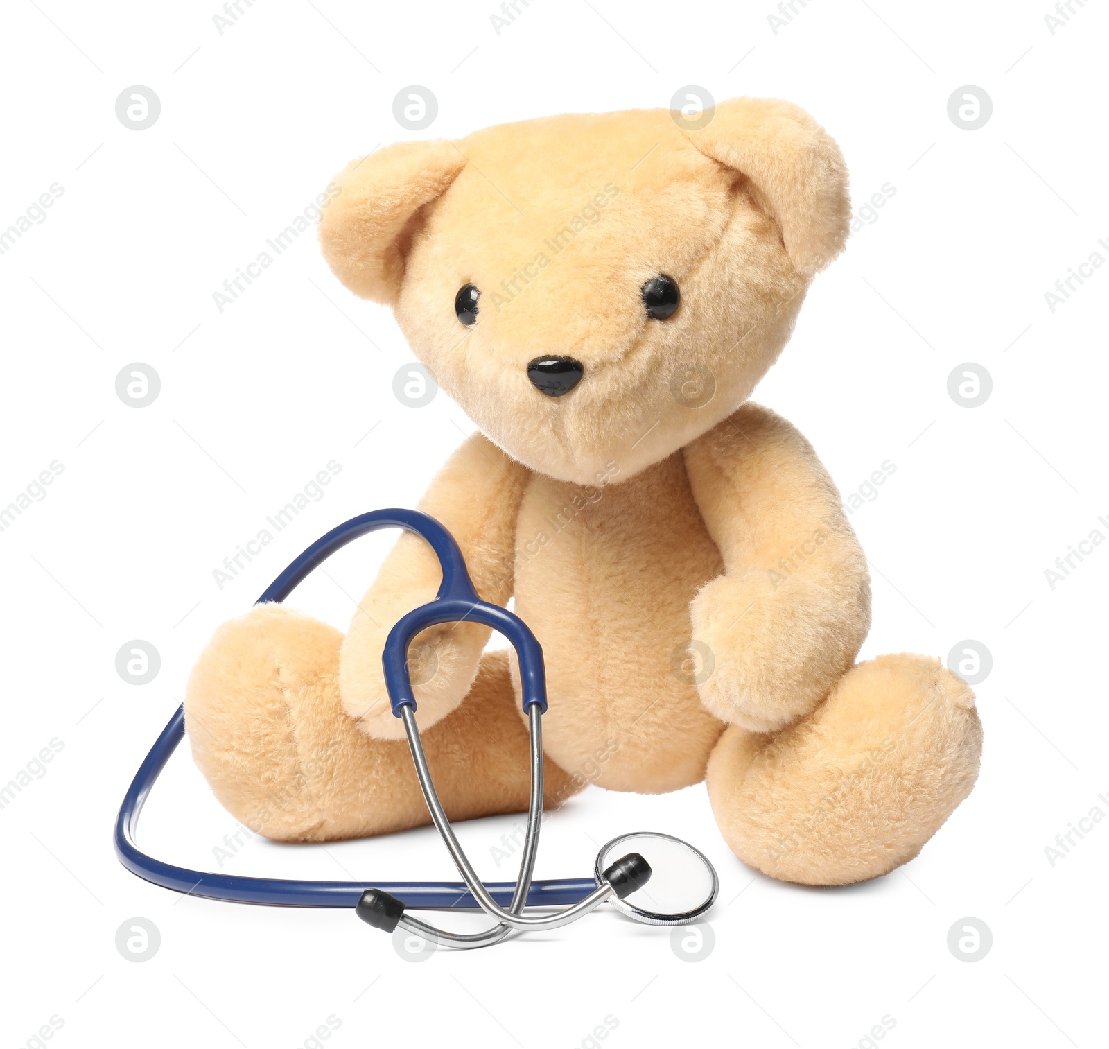 Photo of Pediatrics concept. Teddy bear with stethoscope isolated on white