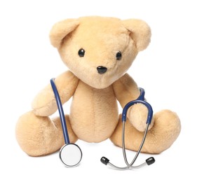 Photo of Pediatrics concept. Teddy bear with stethoscope isolated on white