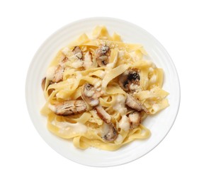 Photo of Tasty Alfredo pasta with chicken and mushrooms isolated on white, top view