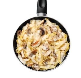 Photo of Tasty Alfredo pasta with chicken and mushrooms in frying pan isolated on white, top view