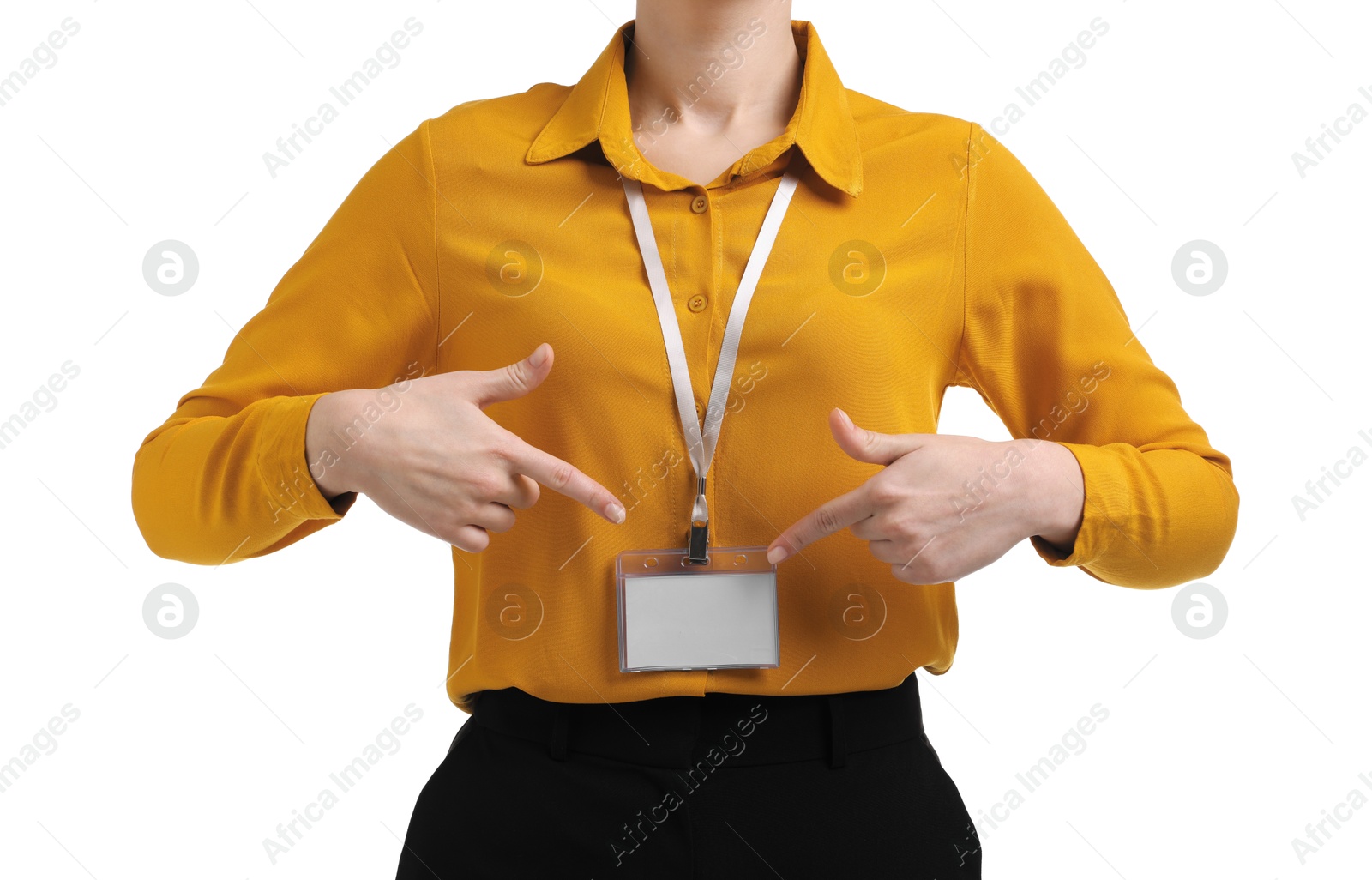 Photo of Woman pointing at her blank badge on white background, closeup