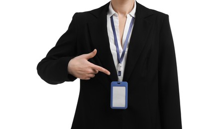 Photo of Woman pointing at her blank badge on white background, closeup