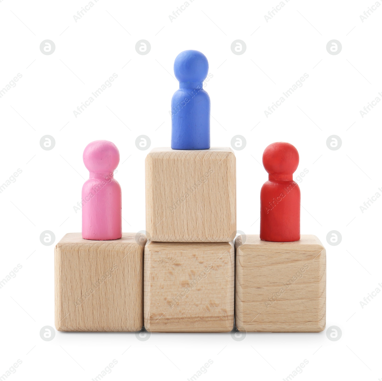 Photo of Human figures on wooden blocks, blue one on top against white background. Competition concept