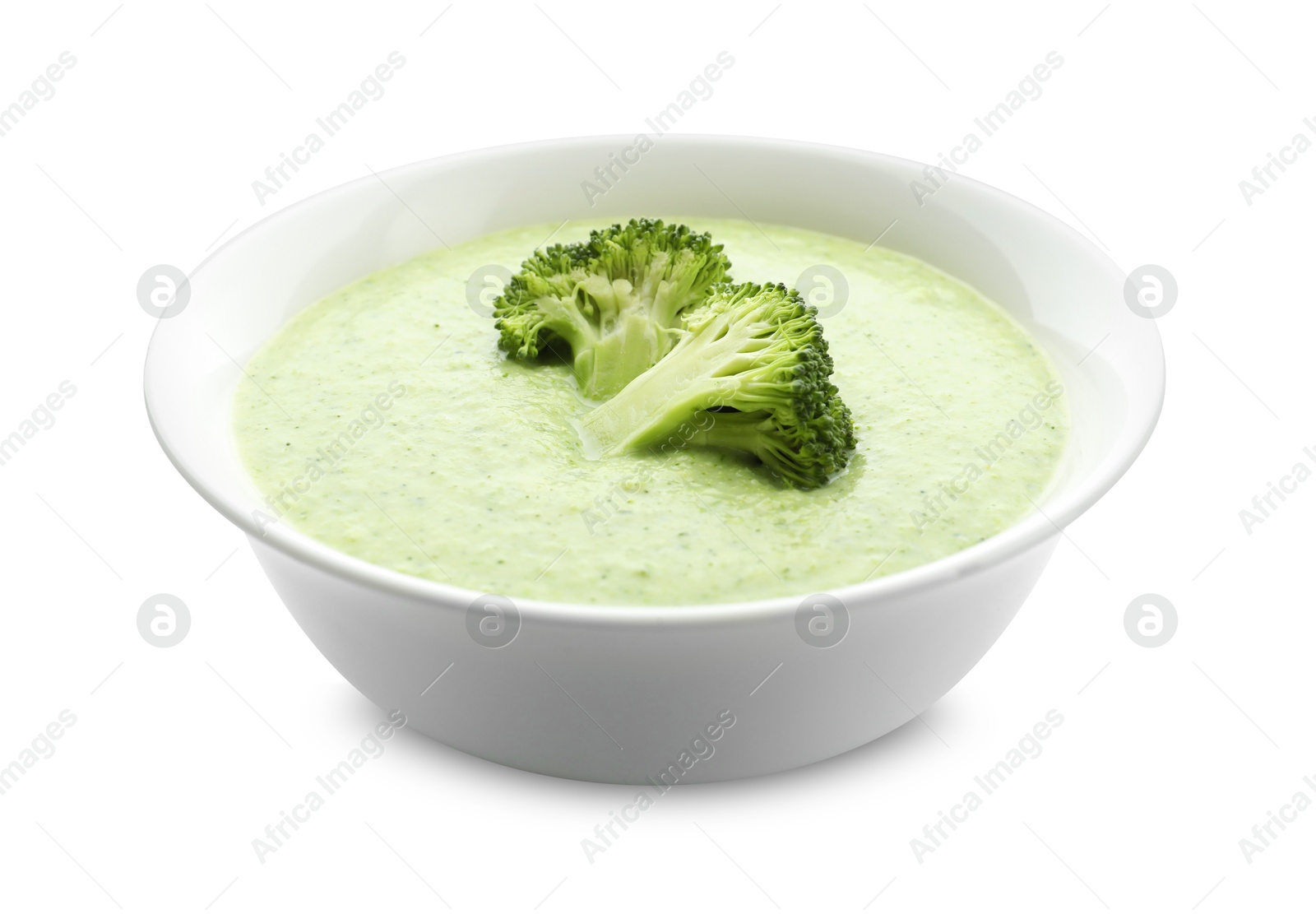 Photo of Delicious broccoli cream soup in bowl isolated on white