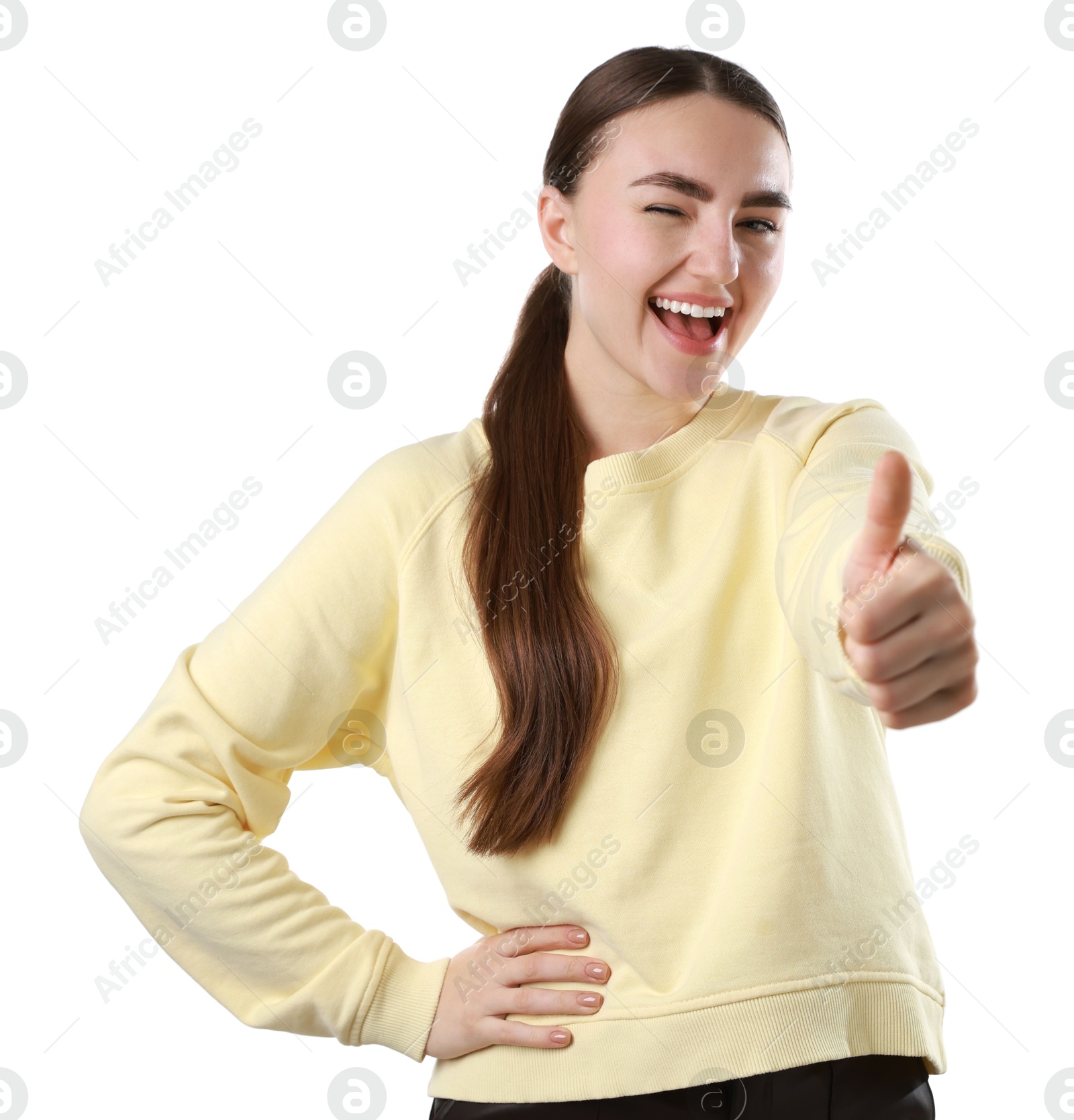 Photo of Happy woman showing thumbs up on white background. Like gesture