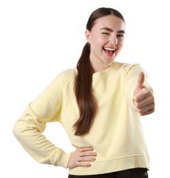 Photo of Happy woman showing thumbs up on white background. Like gesture