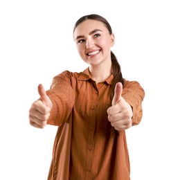 Photo of Happy woman showing thumbs up on white background. Like gesture