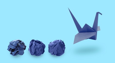 Image of Origami crane and crumpled paper balls on light blue background, banner design. Transformation or new ideas concept