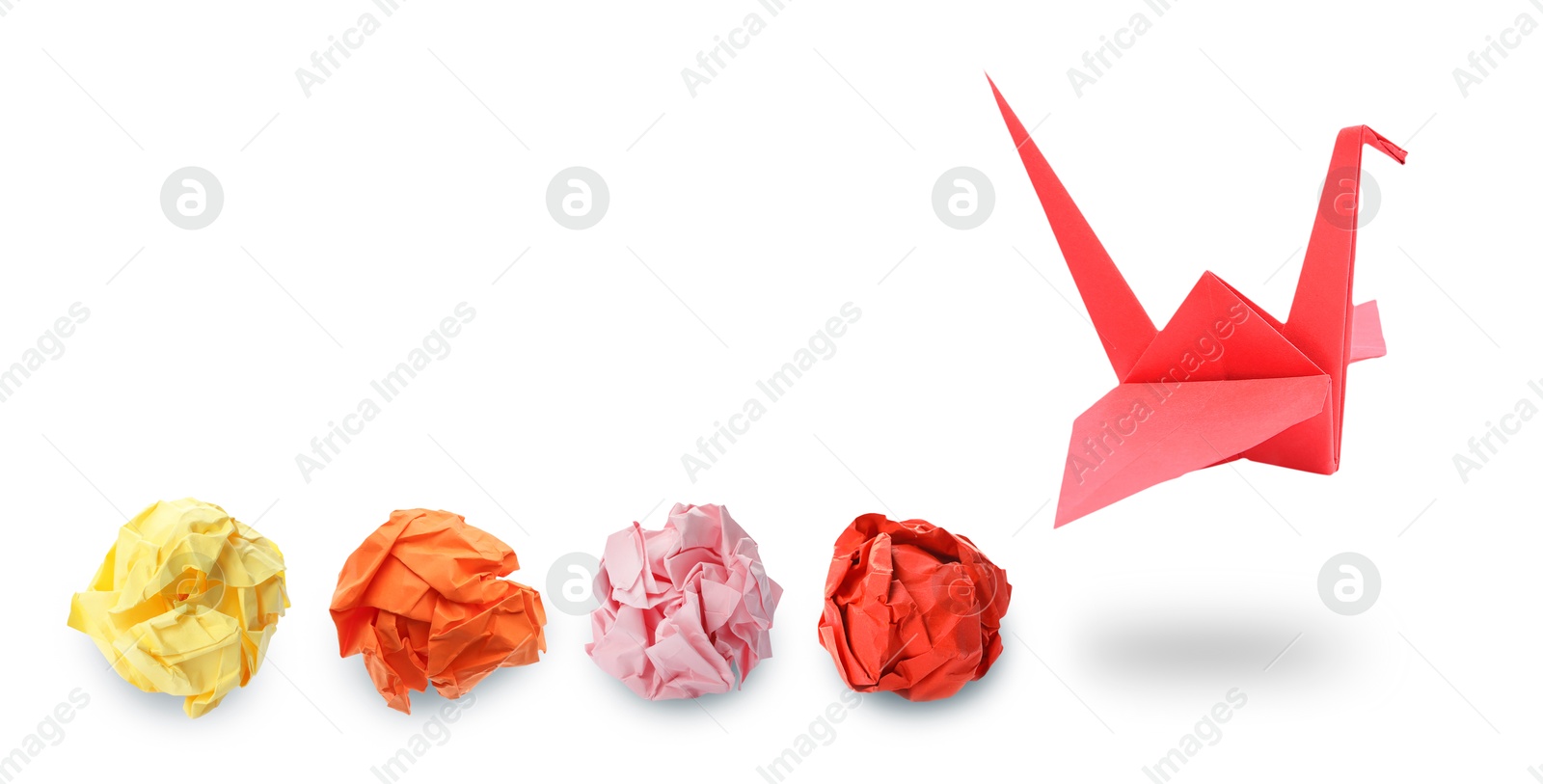 Image of Red origami crane and crumpled paper balls on white background, banner design. Transformation or new ideas concept