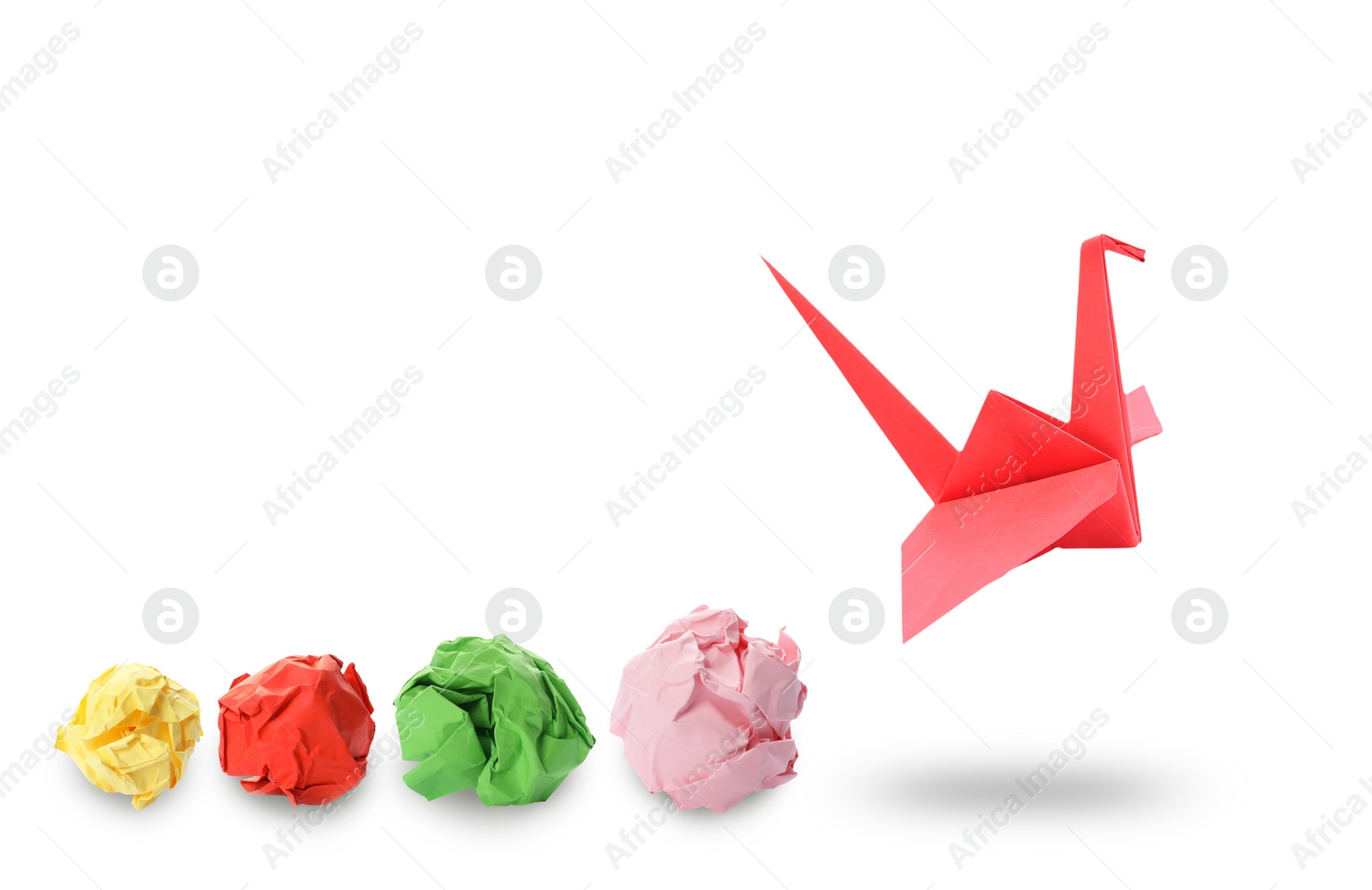 Image of Red origami crane and crumpled paper balls on white background, banner design. Transformation or new ideas concept