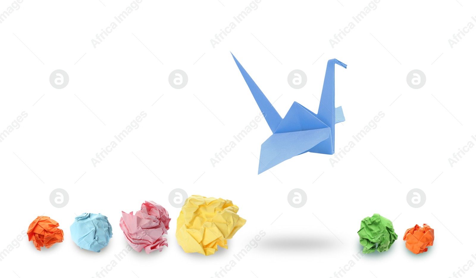 Image of Blue origami crane and crumpled paper balls on white background, banner design. Transformation or leadership concept