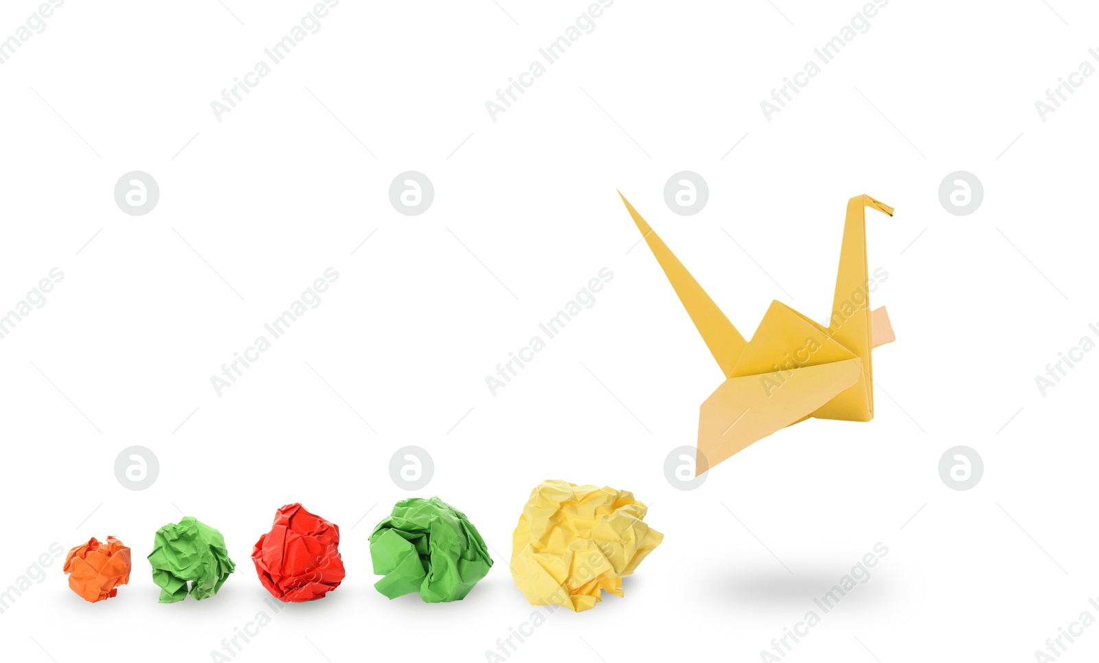 Image of Yellow origami crane and crumpled paper balls on white background, banner design. Transformation or new ideas concept