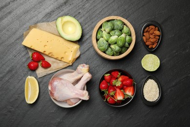 Photo of Different fresh products rich in dopamine on grey textured table, flat lay