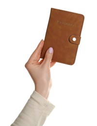 Photo of Woman holding passport in brown cover on white background, closeup