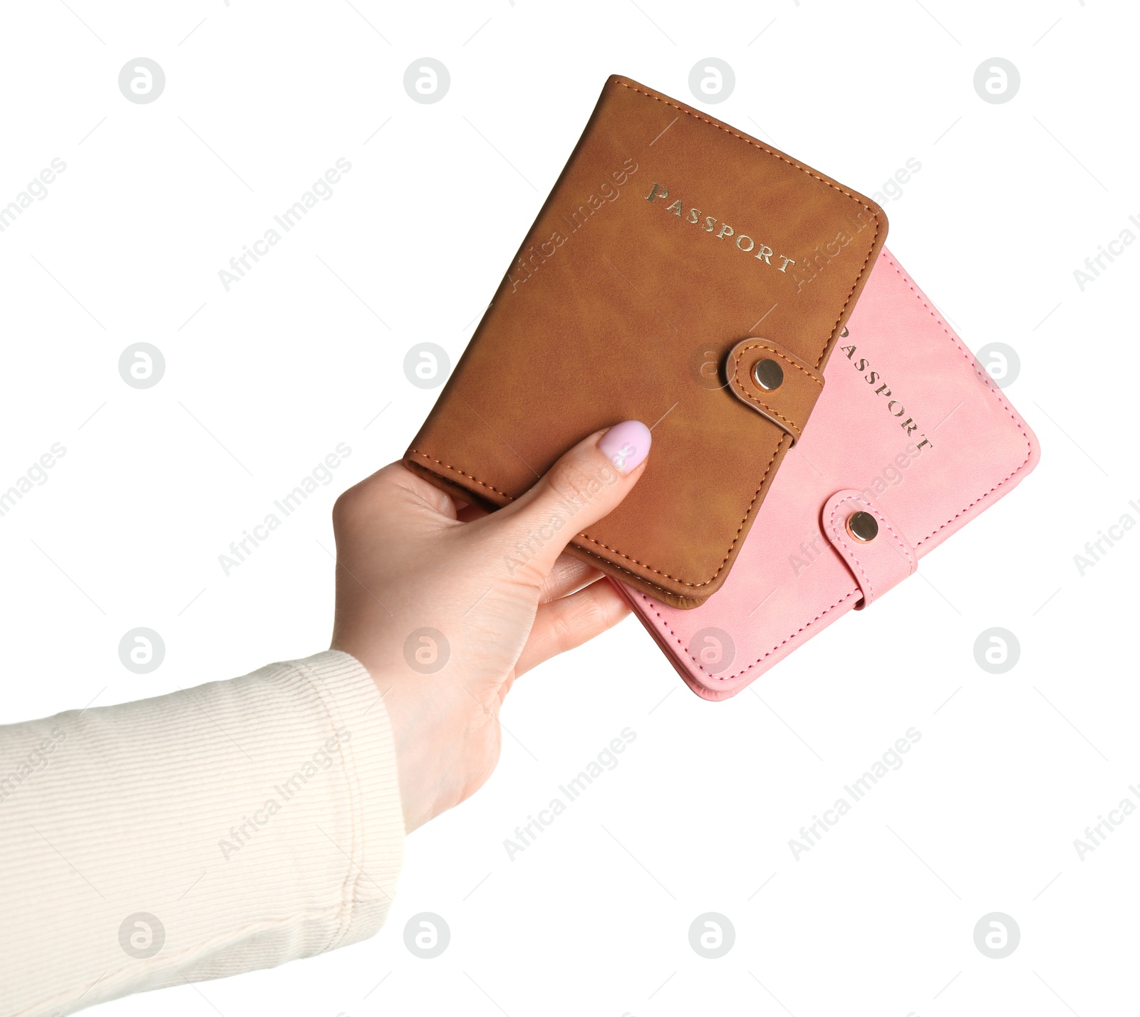 Photo of Woman holding passports in color covers on white background, closeup