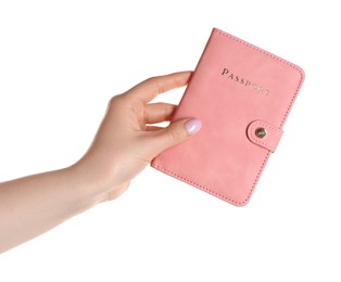 Woman holding passport in pink cover on white background, closeup