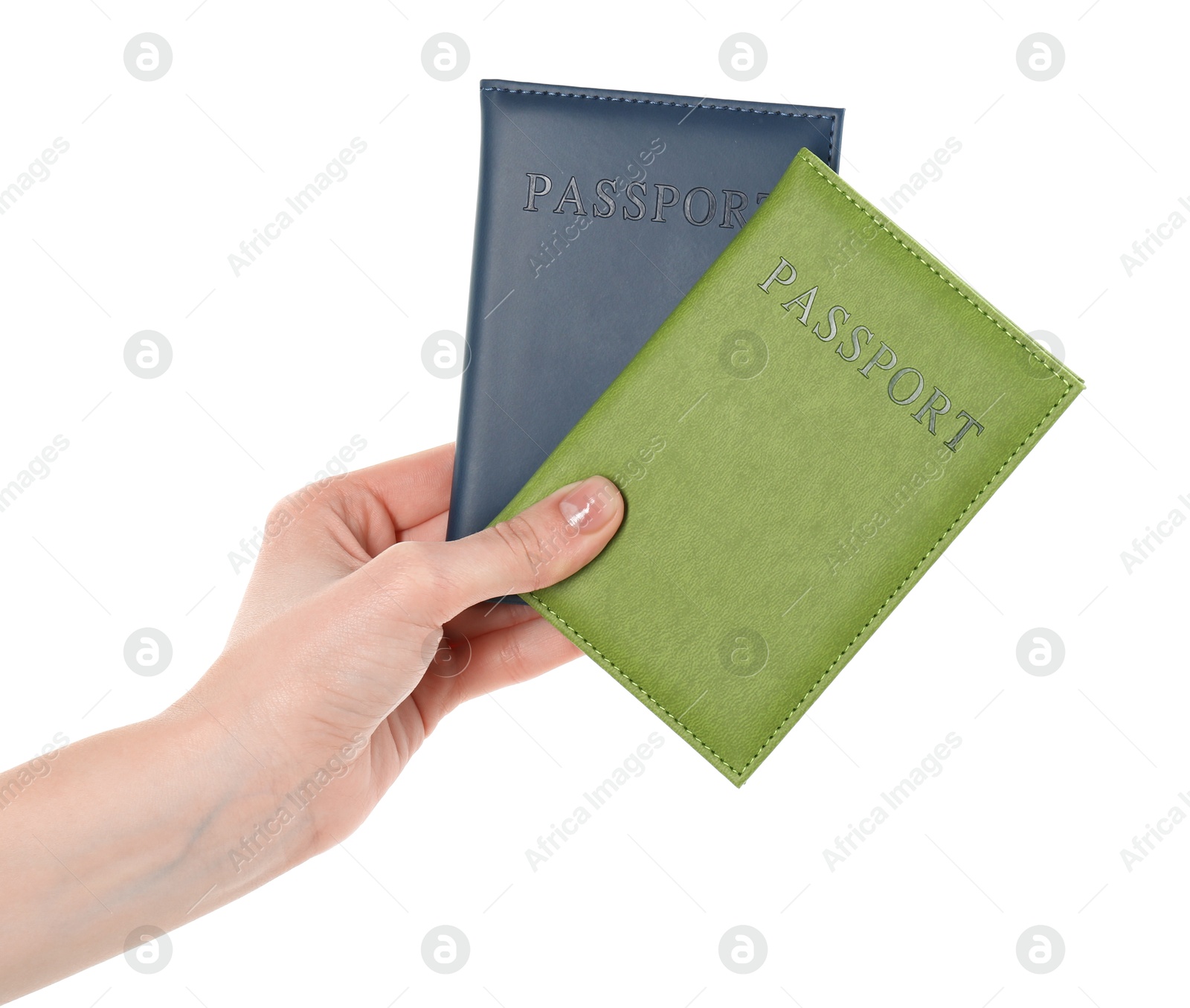 Photo of Woman holding passports in color covers on white background, closeup