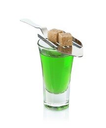 Photo of Absinthe in shot glass, brown sugar and slotted spoon isolated on white