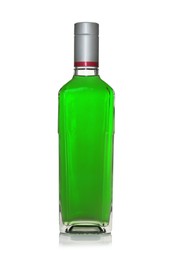 Photo of Absinthe in glass bottle isolated on white