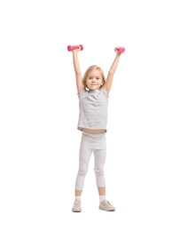 Photo of Little girl exercising with dumbbells on white background. Sport activity