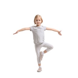 Photo of Little girl exercising on white background. Sport activity