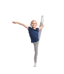 Photo of Little girl exercising on white background. Sport activity