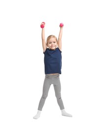 Photo of Little girl exercising with dumbbells on white background. Sport activity