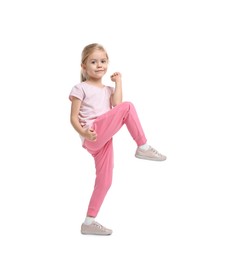 Photo of Little girl exercising on white background. Sport activity