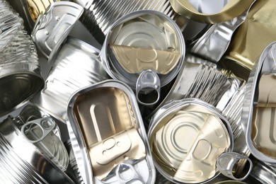 Photo of Many crumpled tin cans as background, top view