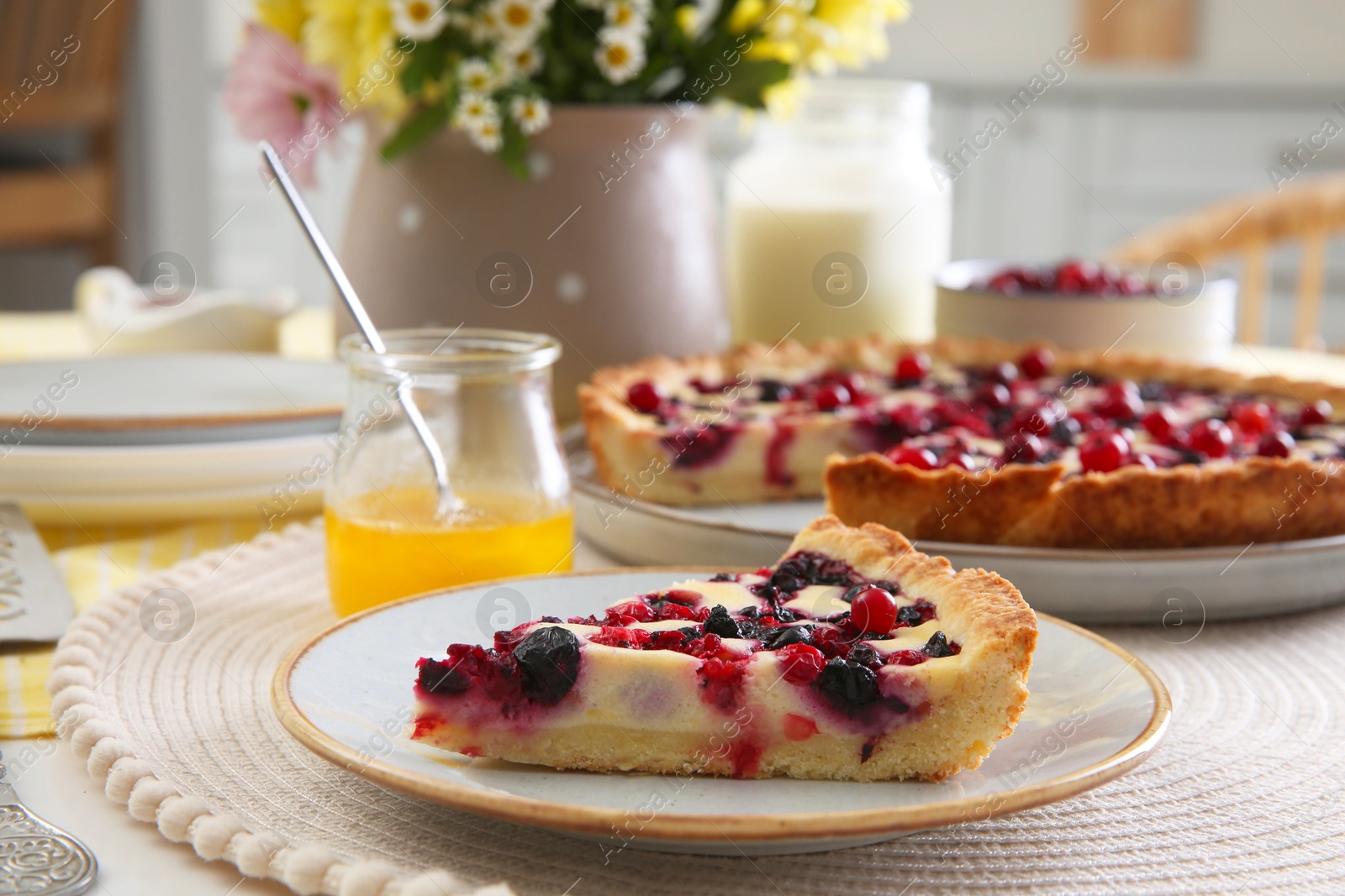 Photo of Piece of delicious currant pie on table indoors, closeup