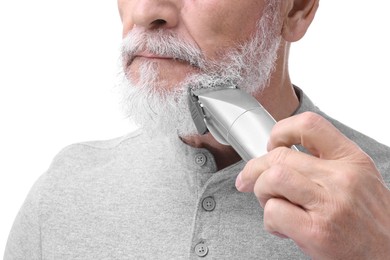 Photo of Senior man trimming beard on white background, closeup