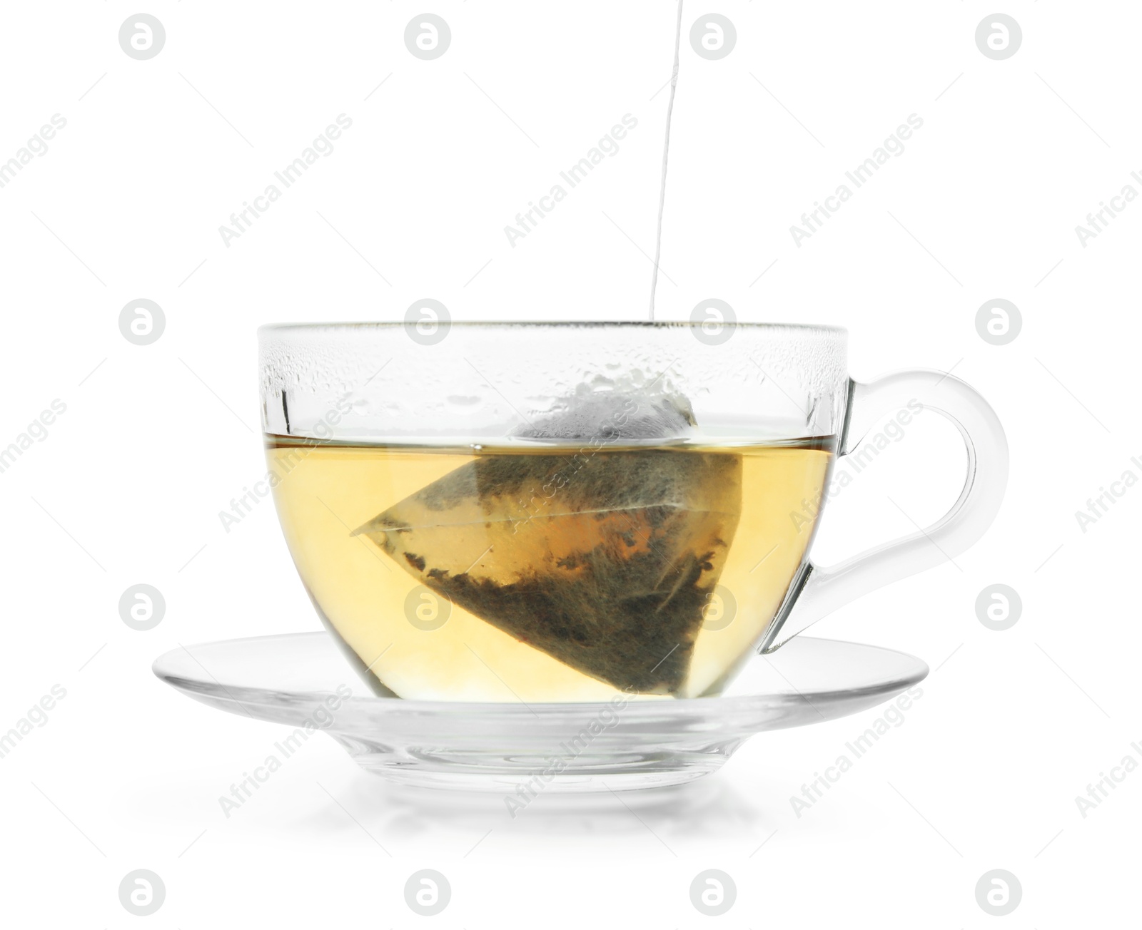 Photo of Cup with tea bag isolated on white