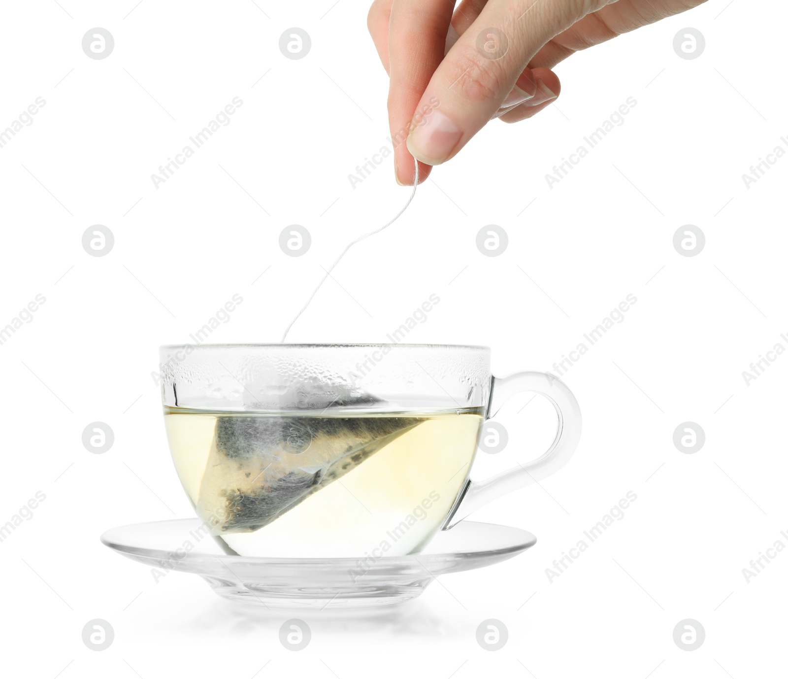 Photo of Cup with tea bag isolated on white