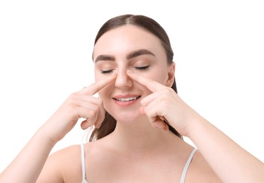 Photo of Woman touching her nose on white background